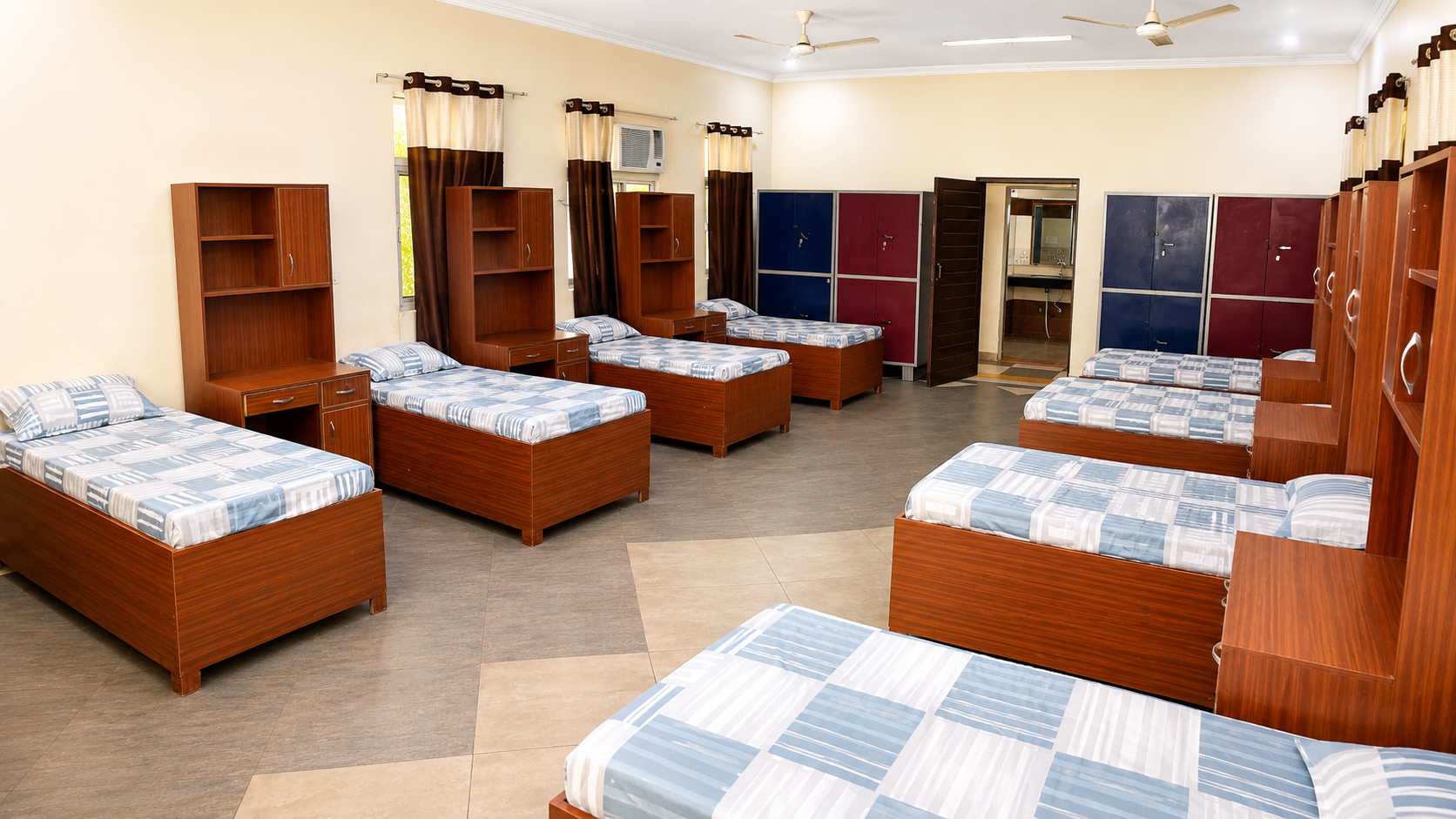 Boarding dormitory with beds and study units — Sitapur Road campus, VEDAM World School