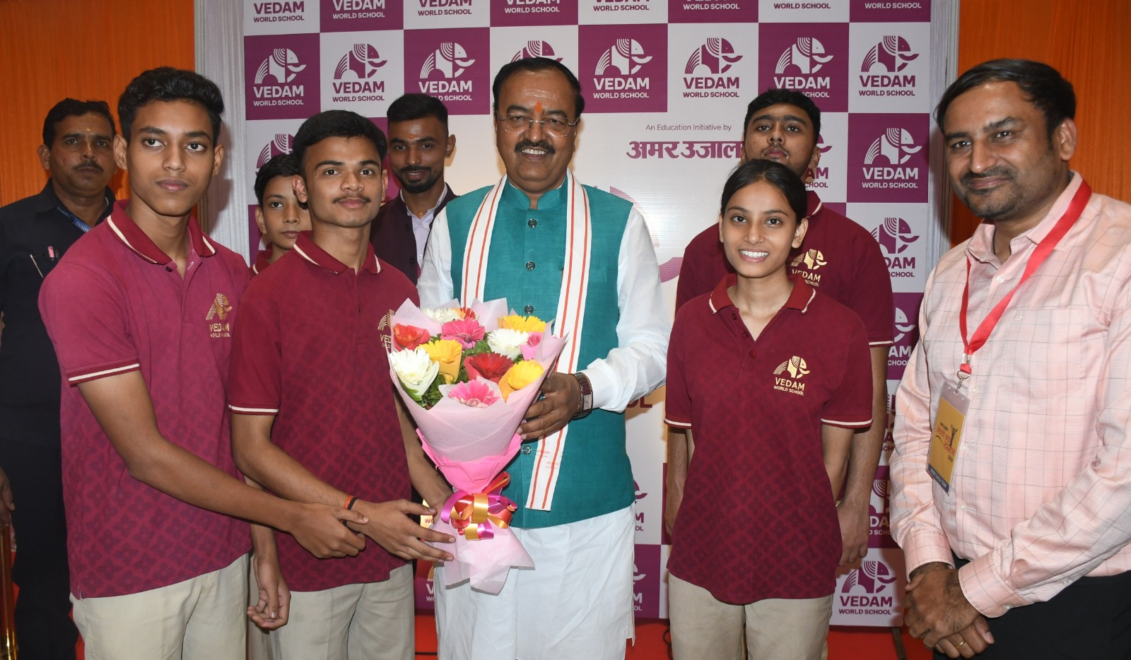 Deputy Chief Minister Keshav Prasad Maurya with Vedam students at the Amar Ujala Medhavi Chhatra Samman Samaroh