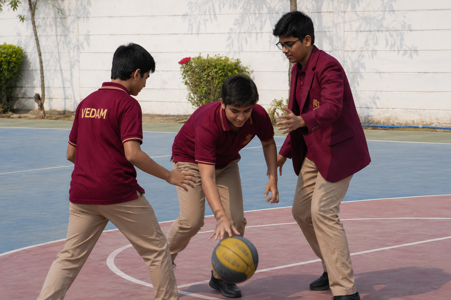 Students playing basketball on the campus court — VEDAM World School